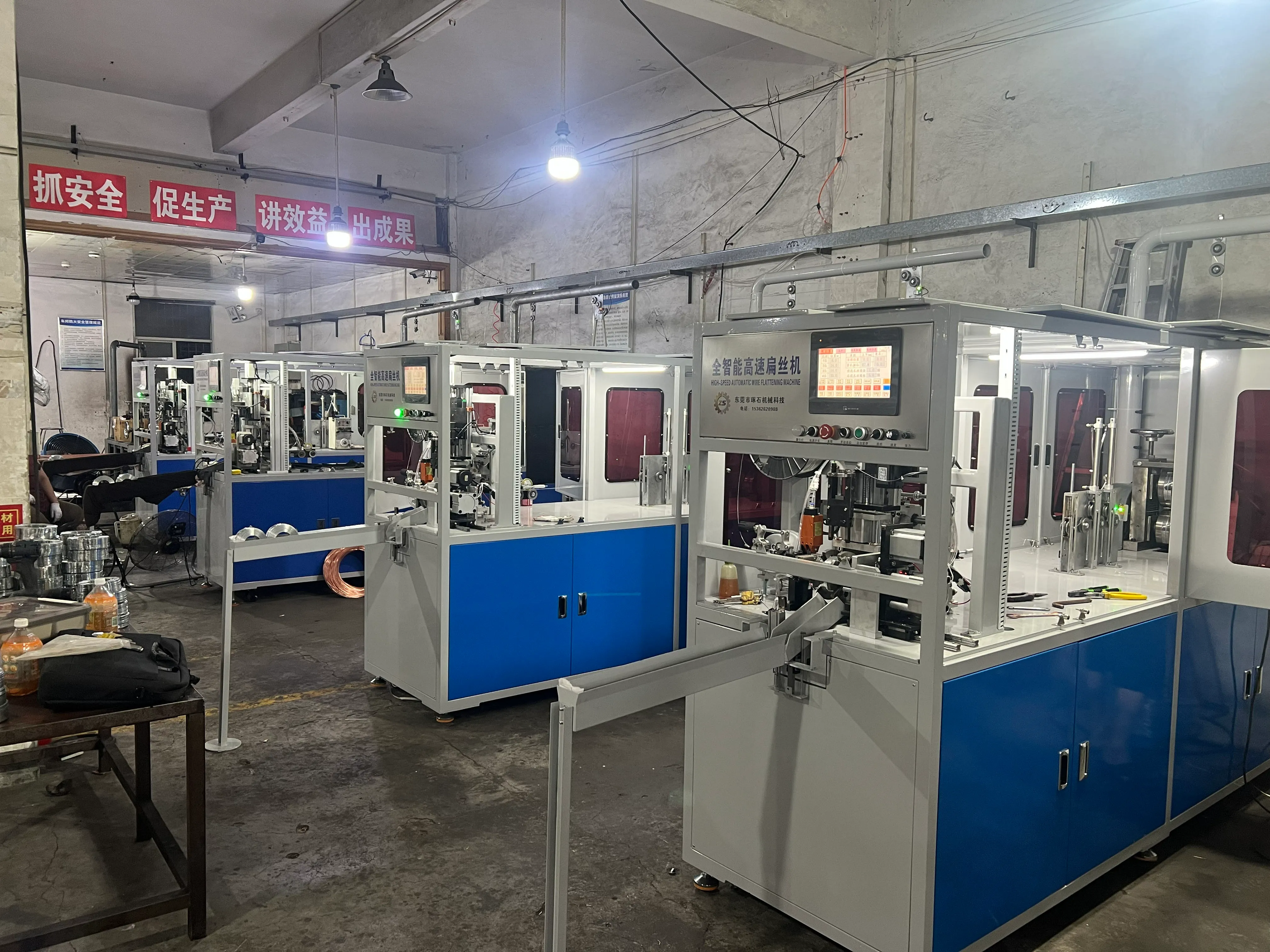 Stitching wire production equipment operating in a workshop